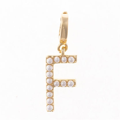 Gold "F" letter pendant with white pearls on 18K gold plated clip-on. Customizable. Available in multiple sizes.