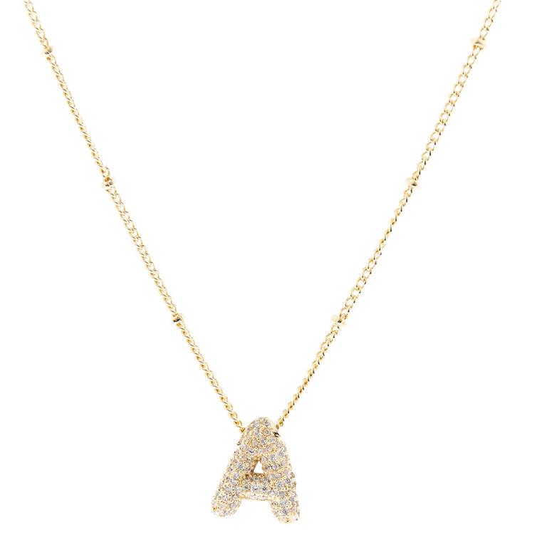 The Chloe Necklace features an "A"-shaped pendant with sparkling stones and delicate bead-like accents on an 18K gold-plated chain. Available in one standard size.