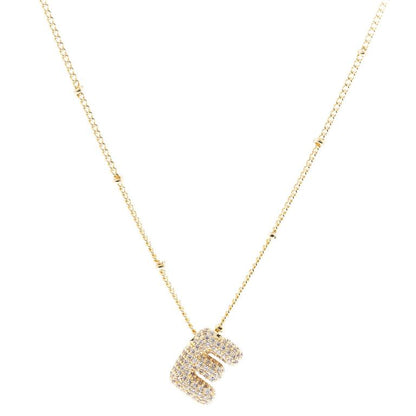 Chloe Necklace: Initial "E" pendant in 18K gold-plated chain with sparkling diamonds. Available sizes: 16", 18", 20".