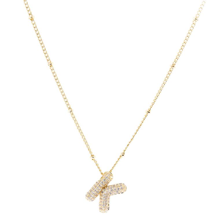 The Chloe Necklace showcases an 18K gold-plated 'K' initial pendant with sparkling diamonds on a delicate chain. Available sizes: Adjustable chain length from 16-18 inches.