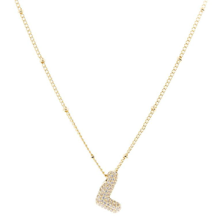 The Chloe Necklace features a delicate chain with an "L" pendant, adorned with sparkling diamonds and elegantly 18K gold plated. Available in one size.