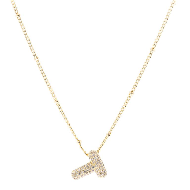 The Chloe Necklace features an 18K Gold Plated chain with a studded letter "T" pendant, embellished with tiny diamonds. Available in 16", 18", and 20" lengths.