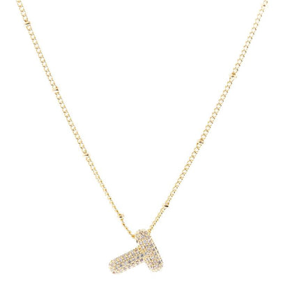 The Chloe Necklace features an 18K Gold Plated chain with a studded letter "T" pendant, embellished with tiny diamonds. Available in 16", 18", and 20" lengths.