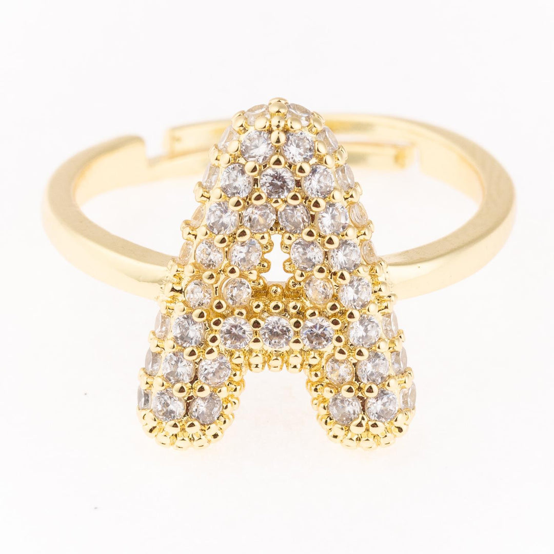 Gold-plated, hypoallergenic Chloe Ring with bold "A" and clear stones. Available in sizes 5-9.