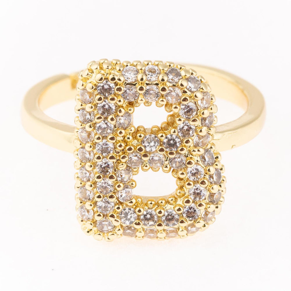 Gold plated initial ring with diamond-studded "B," hypoallergenic. Available in sizes 5-9. Perfect for daily wear.