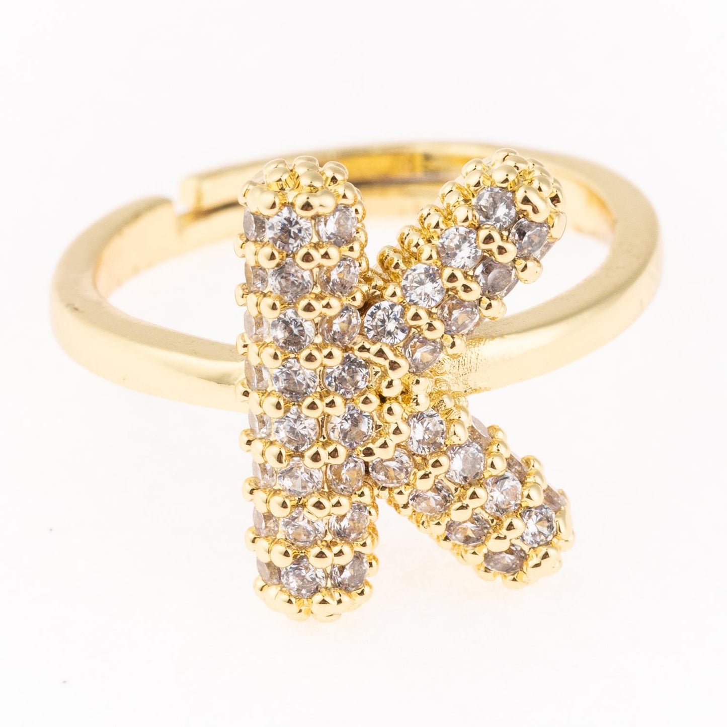 Gold-plated initial "K" ring with diamonds, hypoallergenic. Available sizes: 5–9.