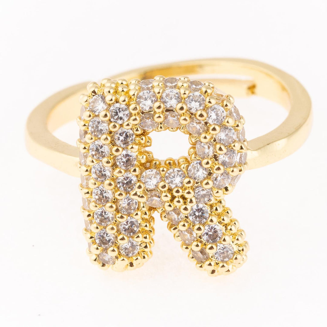 Gold plated Chloe Ring with letter "R" and clear gemstones, hypoallergenic. Available in sizes 5-9.