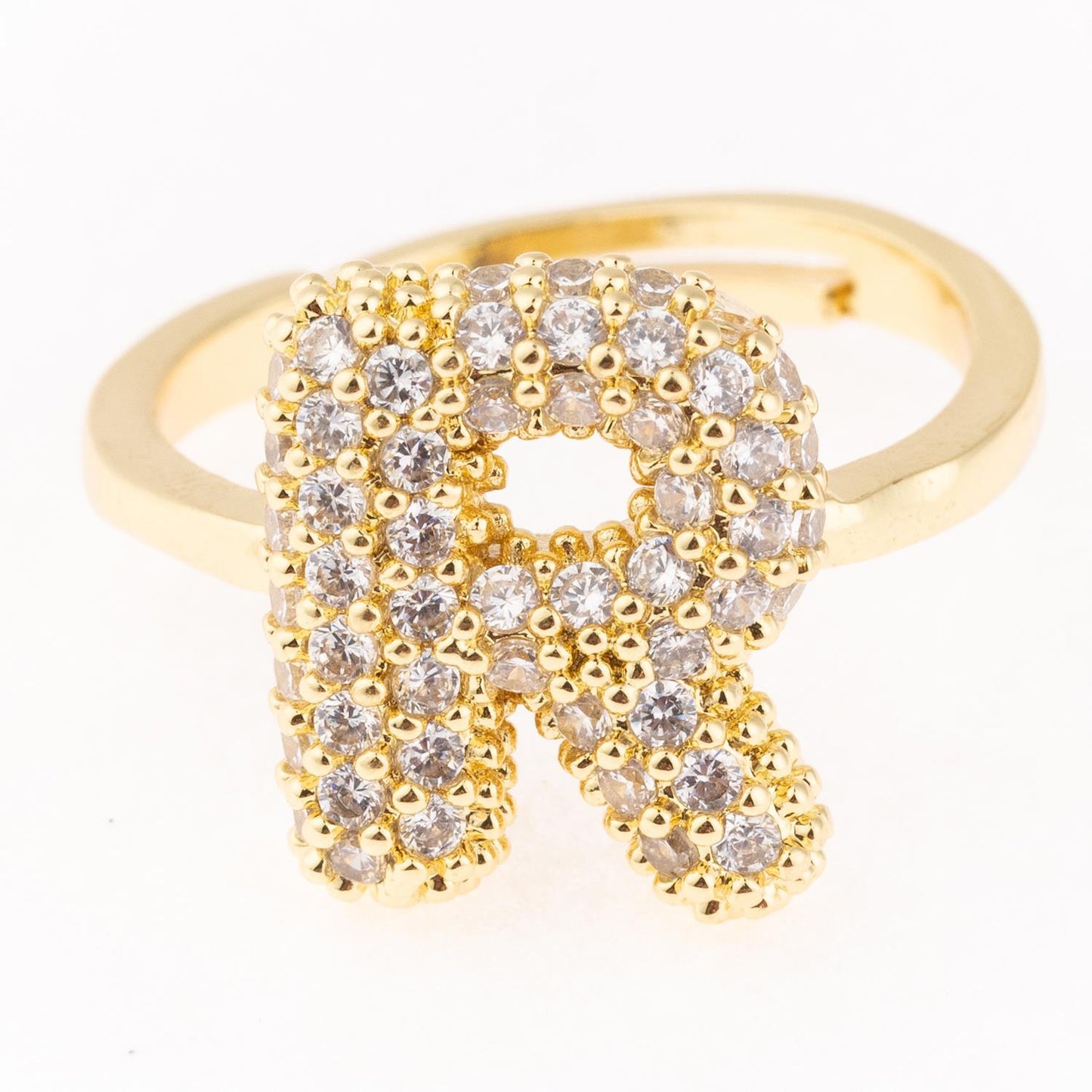 Gold plated Chloe Ring with letter "R" and clear gemstones, hypoallergenic. Available in sizes 5-9.