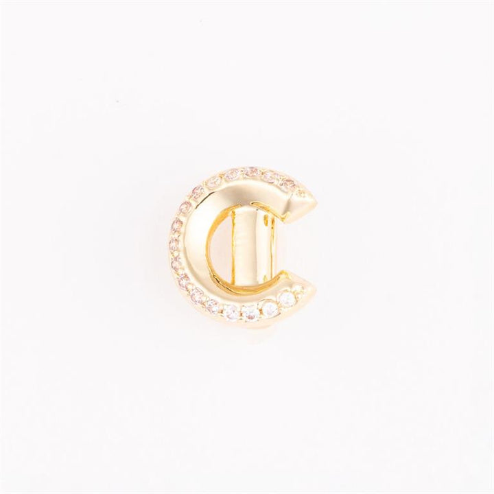 Gold metallic letter "C" charm with clear gemstones on the upper curve. Available in small, medium, and large sizes.