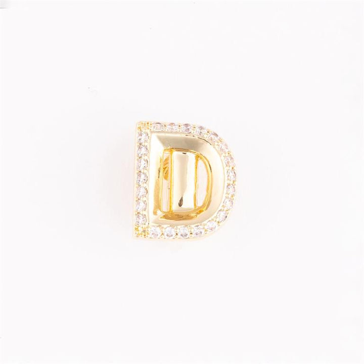 Gold "D"-shaped pin outlined with small clear gemstones. Available in multiple sizes for Camryn Bracelet Charm Bar.