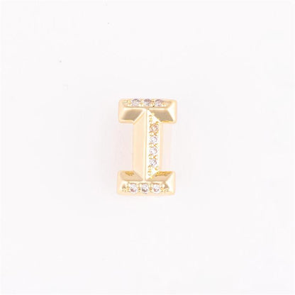 Gold letter "I" charm with clear gemstones in a vertical row. Available sizes: small, medium, large.
