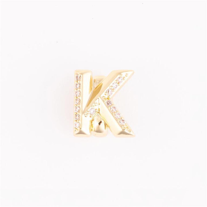 Gold "K" pin with sparkling gemstones for bracelet customization; available in multiple sizes.