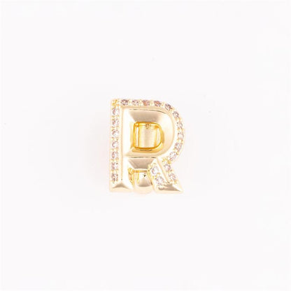 Gold letter "R" charm with clear gemstones on the edge. Available in S, M, L sizes.