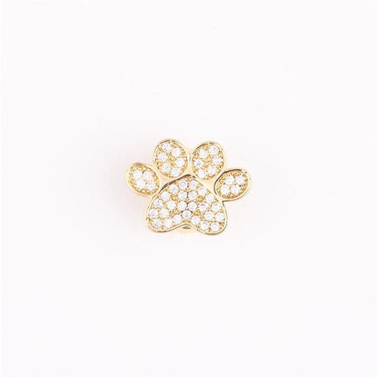 Gold-plated paw-shaped pin with clear crystals. Available in small, medium, and large sizes.