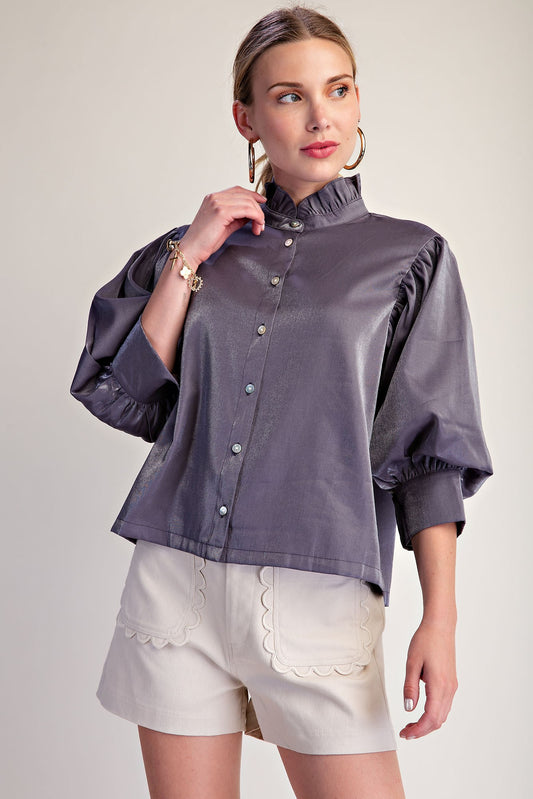Silver Starlight Blouse: shiny, metallic-effect purple button-up with puffed sleeves and subtle ruffle neckline. Available in sizes XS–XL.