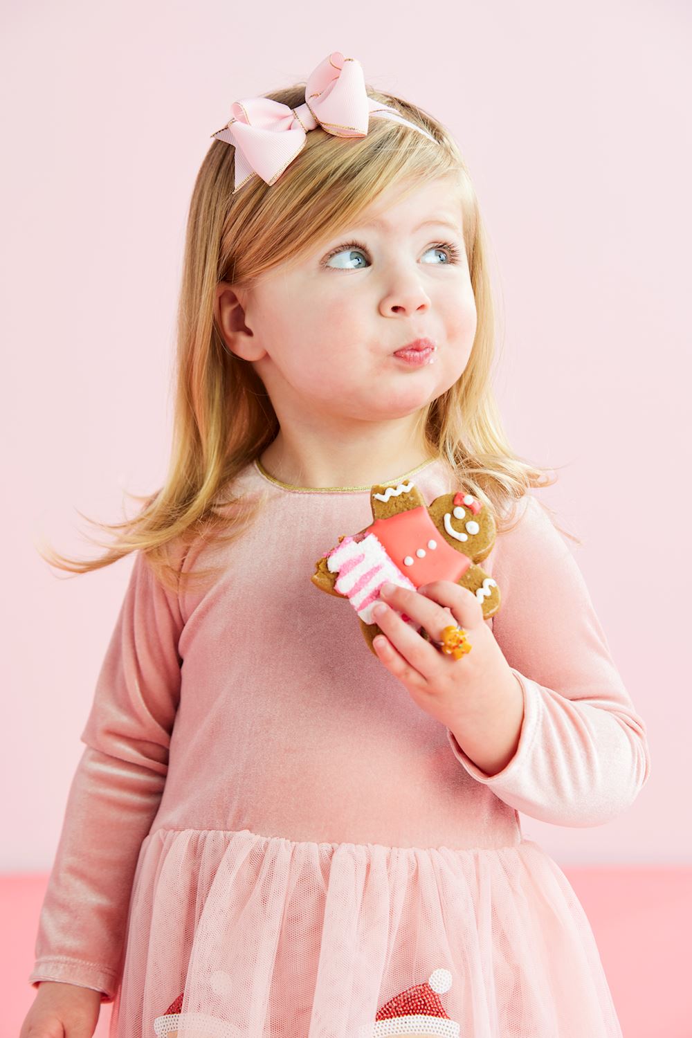 Pink sequin tutu dress with long sleeves, velour bodice, and mesh skirt. Sizes 2T-8.