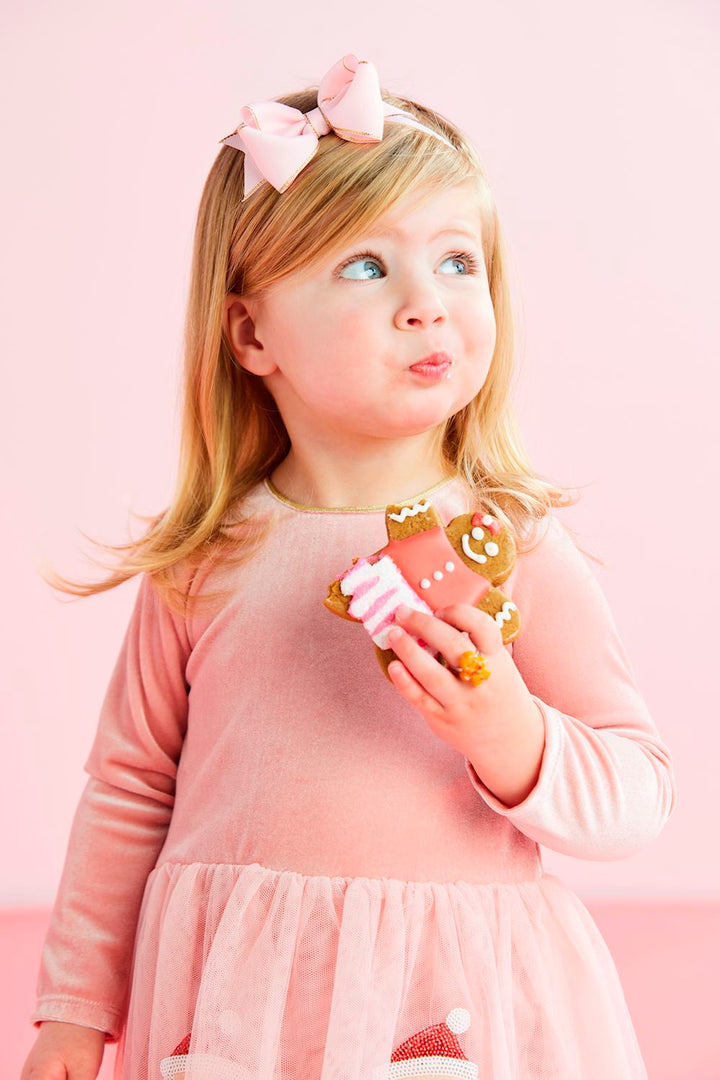 Pink sequin tutu dress with long sleeves, velour bodice, and mesh skirt. Sizes 2T-8.