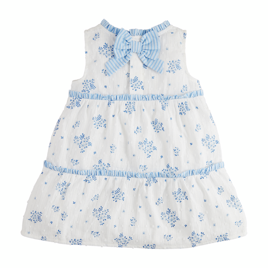 Blue Floral Tiered Toddler Dress: Sleeveless white cotton with blue floral patterns, ruffled trim, striped blue bow at back, tiered skirt. Sizes: 2T, 3T, 4T, 5T.