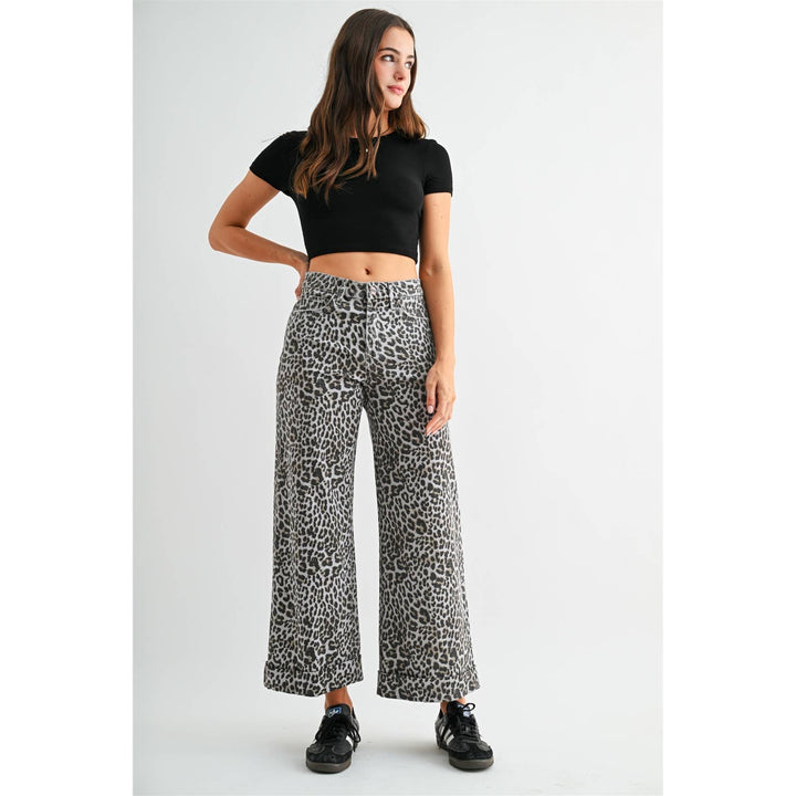 High-rise wide-leg cropped jeans in grey leopard print with cuffed hems, size 27.