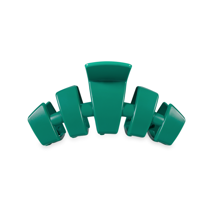 Matte green hair clip with five curved arms, center arm largest. Available in multiple sizes for secure hold.