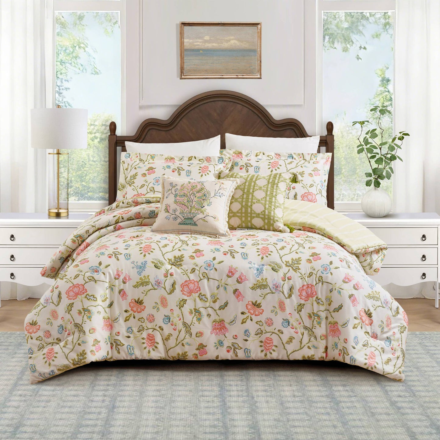 SUGAR MILL EMBROIDERED BOUQUET PILLOW by Spartina displayed on a neatly made bed; available in standard and lumbar sizes.