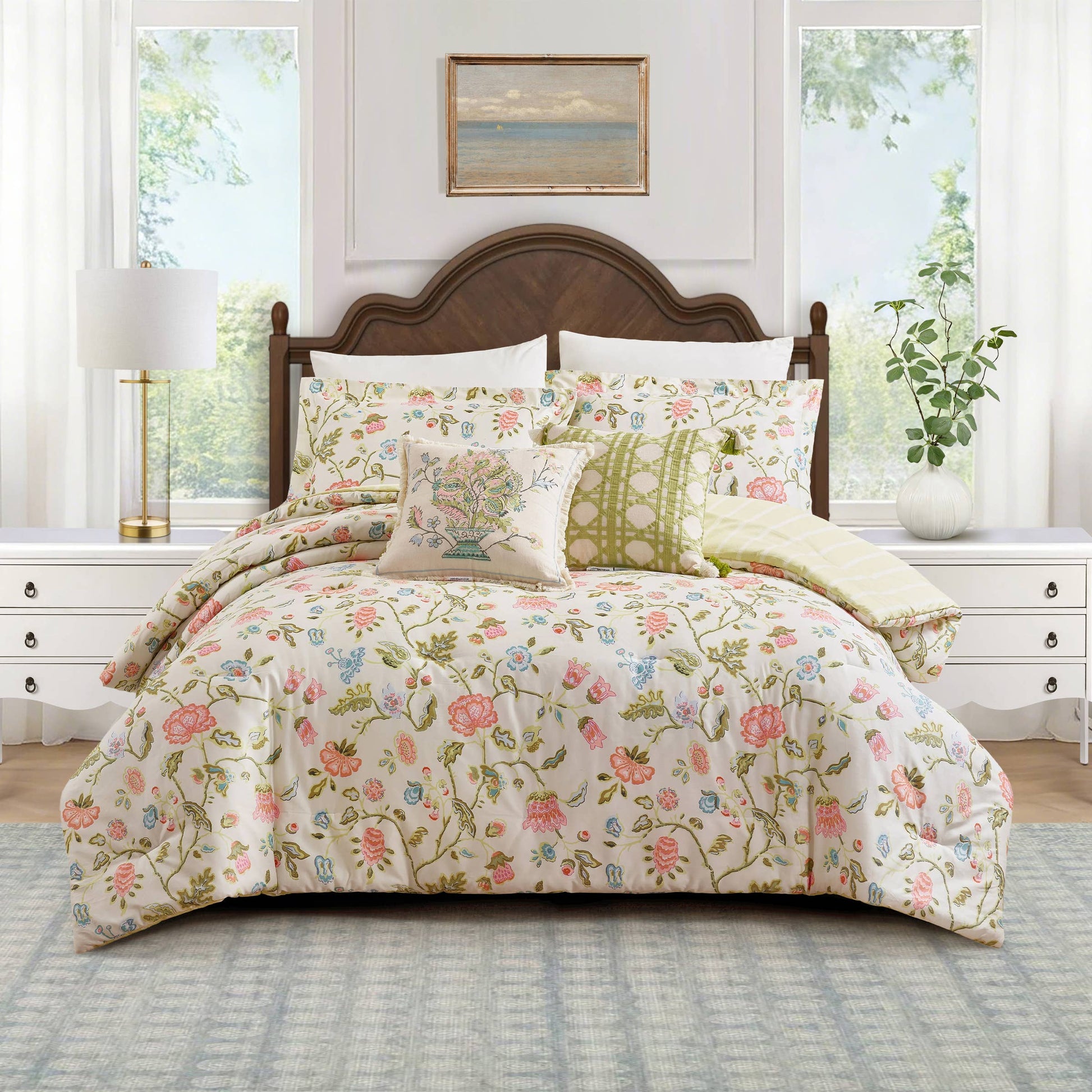 SUGAR MILL EMBROIDERED BOUQUET PILLOW by Spartina displayed on a neatly made bed; available in standard and lumbar sizes.