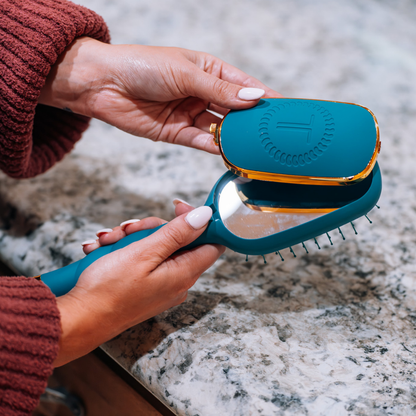 Detangler Hair Brush for Fine Hair - Teal With It, with built-in mirror and matching teal cover. Available in small, medium, and large sizes.