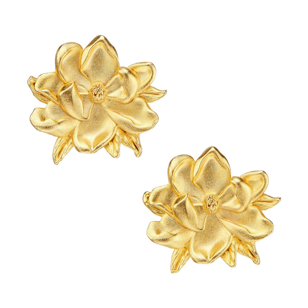Magnolia Studs: Gold-colored, intricately detailed flower earrings with textured petals. Available in small and medium sizes.
