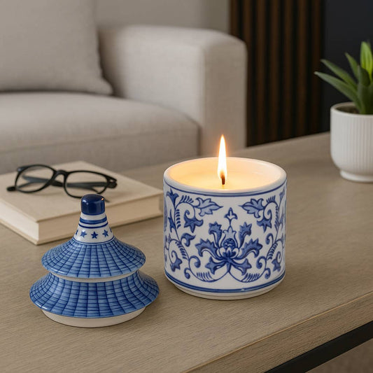 Blue Ceramic Plumeria Chinoiserie Pagoda Candle, 9 oz, glows in a reusable jar with lid.