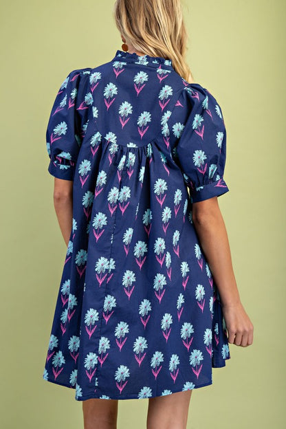 Midnight Floral Print Mini Dress with short puff sleeves, blue and pink floral pattern. Available in sizes XS-XL.