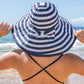 Stripe Bow Accent Sunhat: Wide-brim sunhat featuring a striped bow accent. Sizes available: S, M, L.