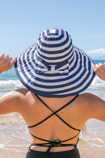 Stripe Bow Accent Sunhat: Wide-brim sunhat featuring a striped bow accent. Sizes available: S, M, L.