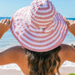 Stripe Bow Accent Sunhat: Pink and white design with striped bow. Sizes available: S, M, L.