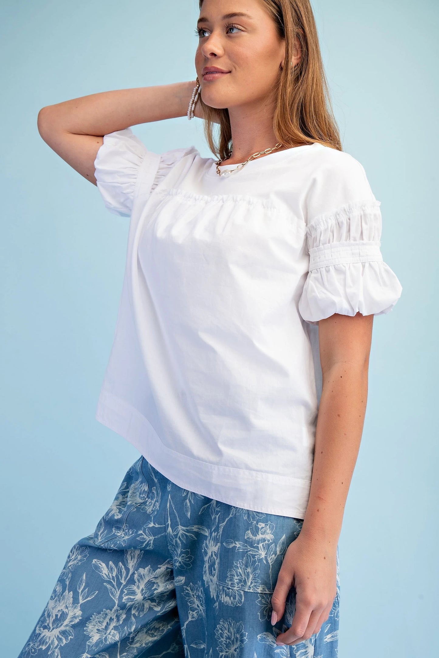 White Mixed Fabric Puff Sleeve Top with relaxed fit. Available in sizes XS-XL.