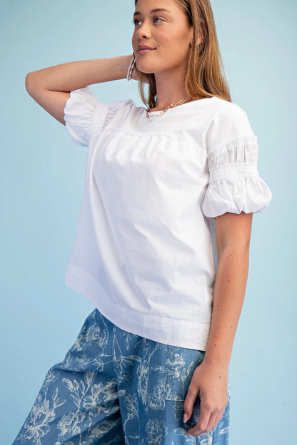 White Mixed Fabric Puff Sleeve Top with relaxed fit. Available in sizes XS-XL.