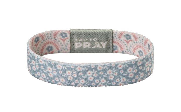Tap To Pray™ Wristbands: Boho blue and white floral elastic fabric wristband with a grey “TAP TO PRAY” embossed tab.