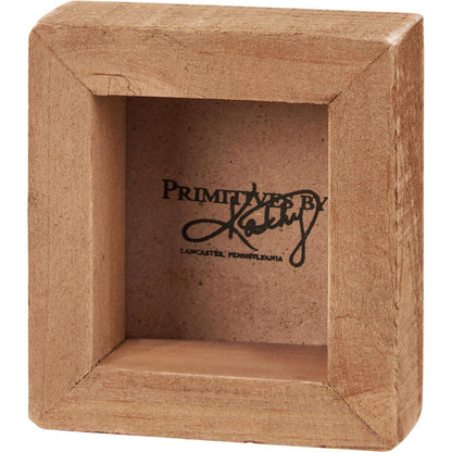 The Mini Best Dad Ever Box Sign is a wooden shadow box frame featuring visible grain, a recessed back, and an open front. Available in one size.