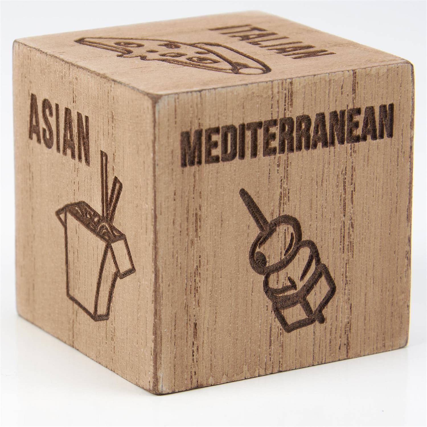 The Dinner Decision Dice is a wooden cube with food icons: Asian (noodle box), Mediterranean (kebab skewer), and Italian (pizza slice) to inspire meal choices. Size: Standard cube dimensions.