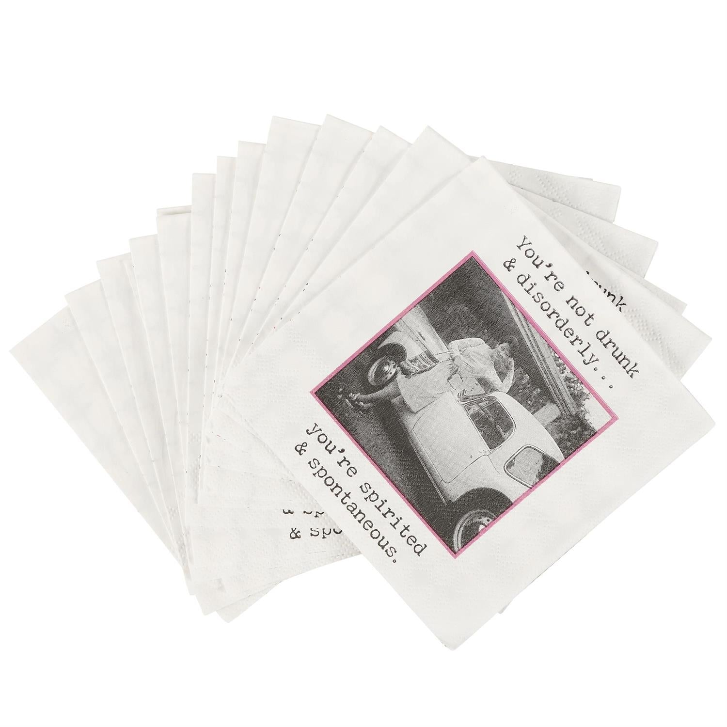 Beverage napkins with vintage print and bold text, “You’re not drunk & disorderly. You’re spirited & spontaneous.” 5"x5" size.