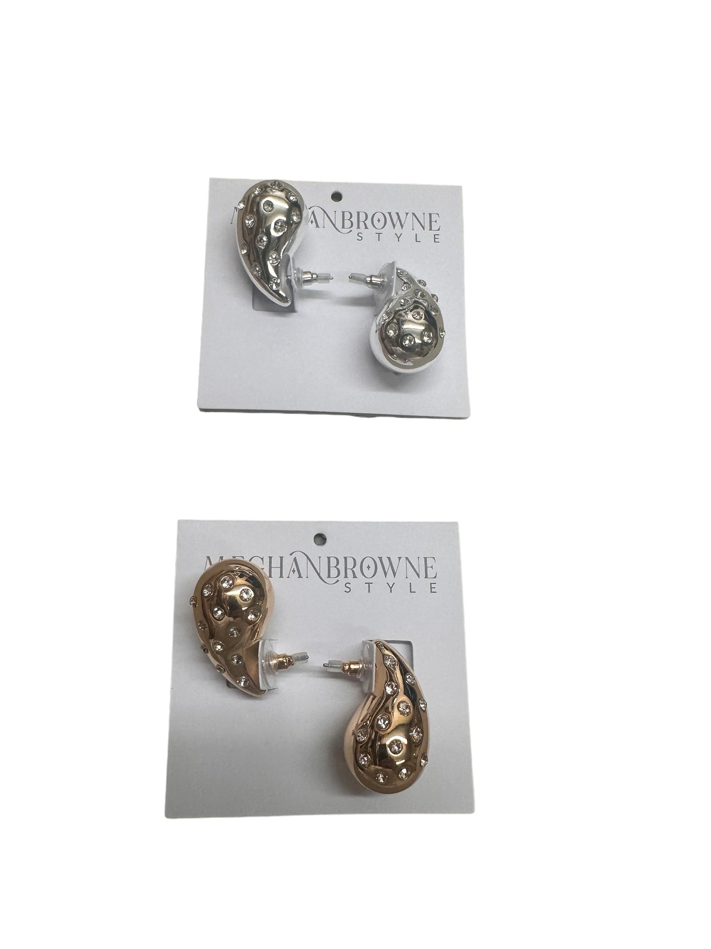 Paisley-shaped Spin Diamond Earrings; one pair in silver, the other in bronze. Adorned with small, reflective decorative elements resembling gold and silver. Available sizes: small and medium.