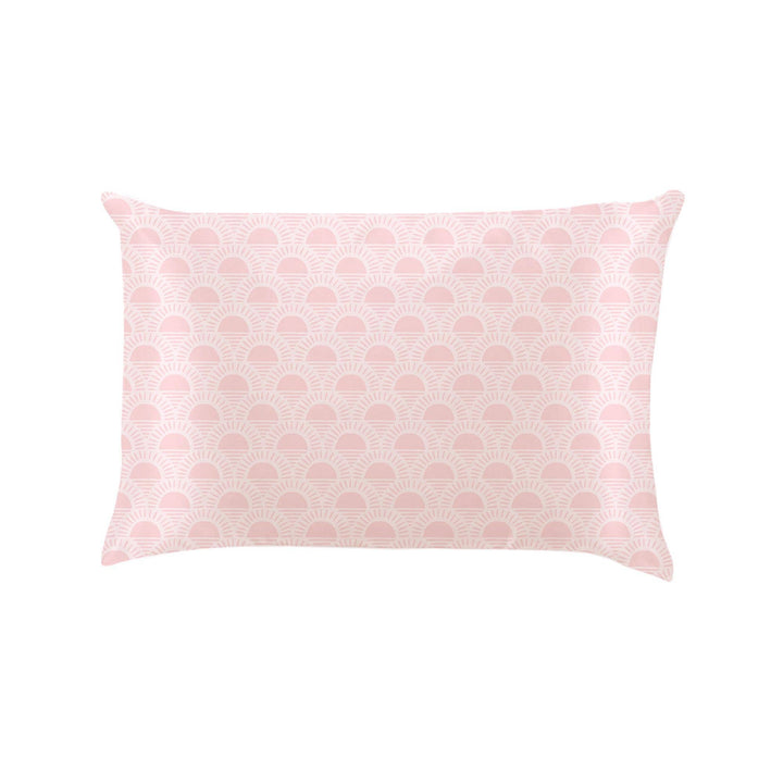 Rectangular travel pillowcase with a light pink background and repeating white scallop pattern; available in travel size.