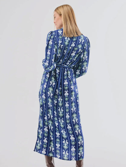 Ava Ikat Stripe Dress: ankle-length, long-sleeve blue dress with white and green stripes. Available in XS–XL.