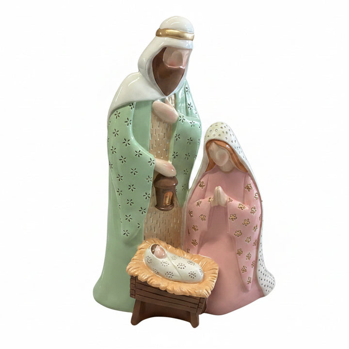 Pastel Nativity scene with Joseph, Mary, and baby Jesus in pink and green floral patterns. Available in various sizes.
