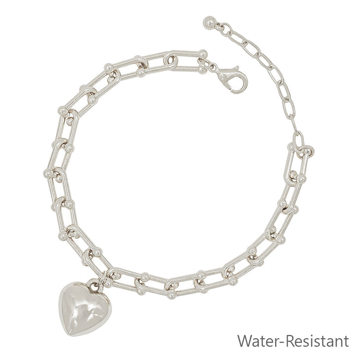 Water Resistant Silver Chain with Puffy Heart; rectangular links, small beads. Sizes available: S, M, L. “Water-Resistant” text shown.