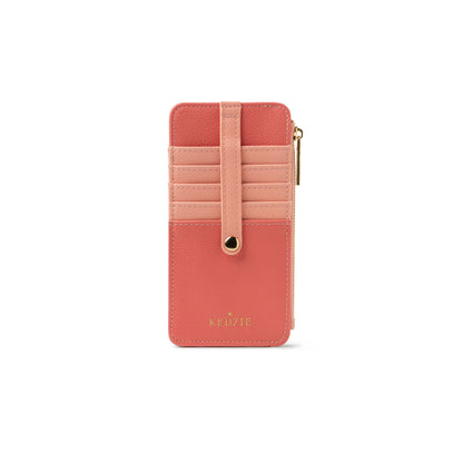 Two-tone pink vegan leather wallet with multiple card slots, secure strap and gold button closure, side zippered cash pocket, gold “KEDZIE” embossing on front, and cheetah print lining. Sizes available: not specified.