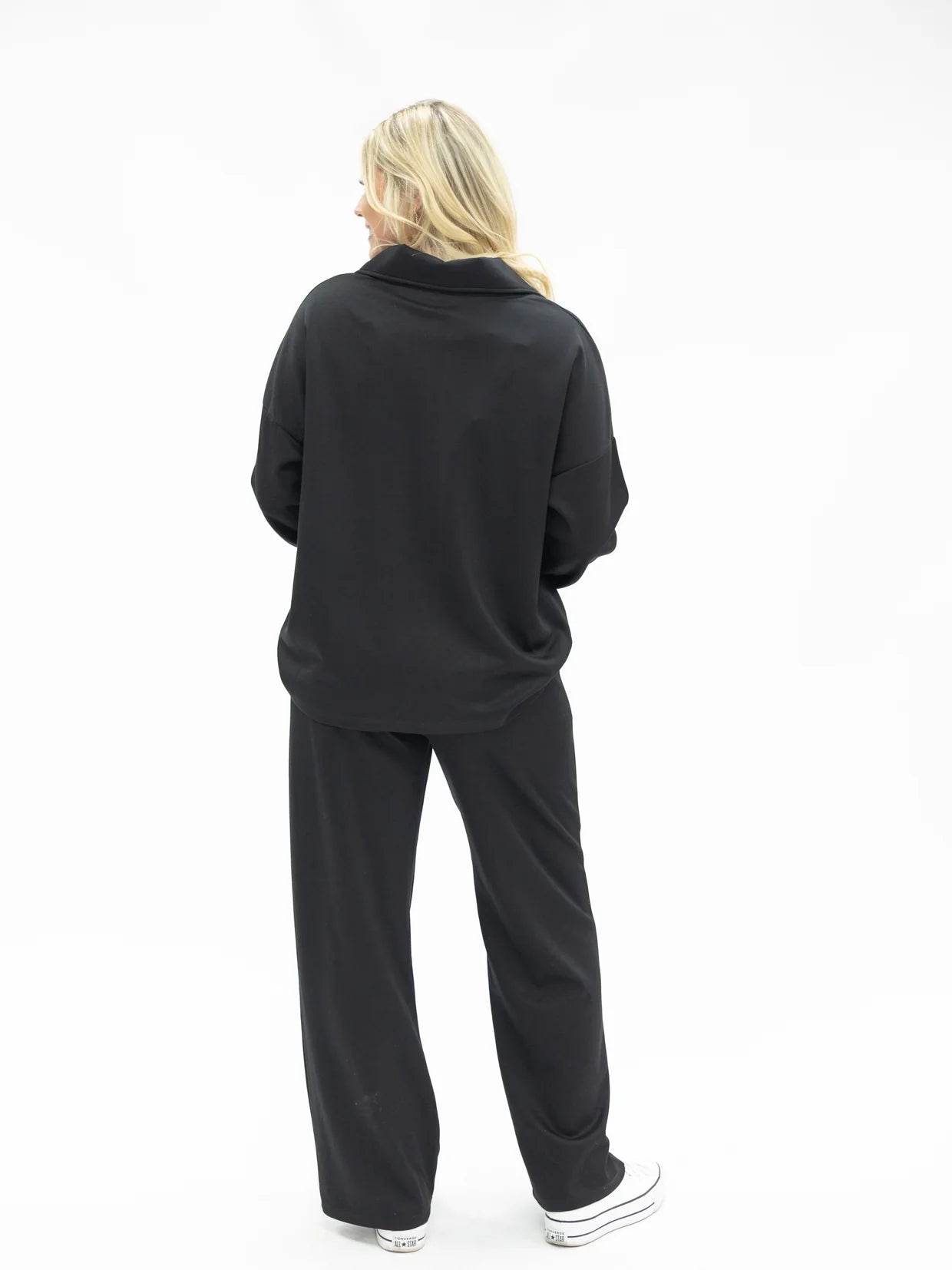 Black Butter Soft Pants with wide-leg silhouette; available in sizes XS–XL.