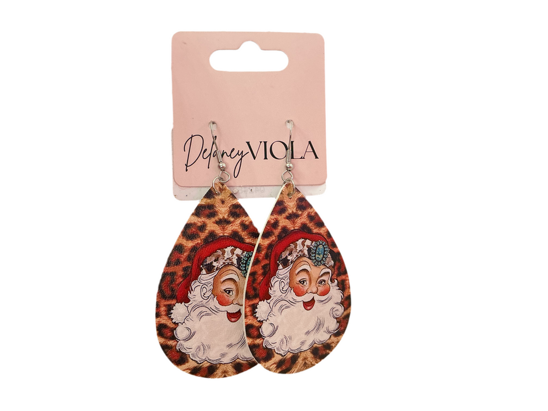 Teardrop-shaped cheetah print Santa Claus earring with vintage illustration.