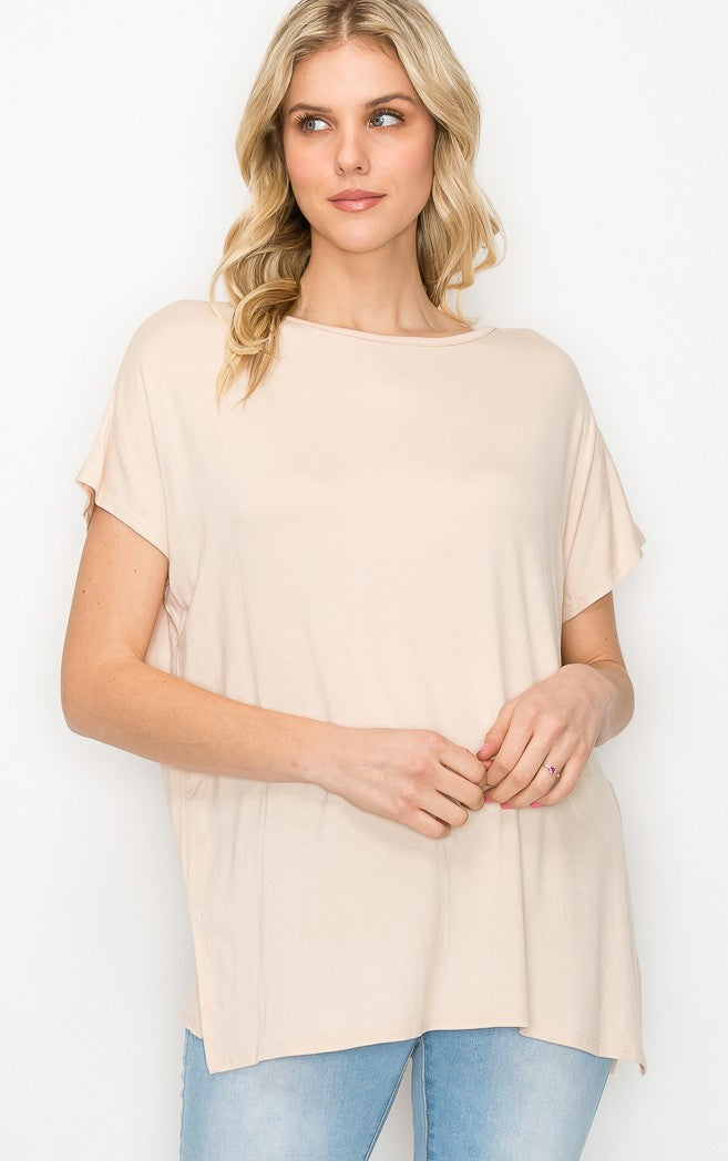 The Perfect Shirt: short-sleeved, light beige rayon blend top. Available in sizes XS-XL.