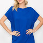 The Perfect Shirt: loose-fitting, bright blue rayon blend top. Available in sizes XS-XL.