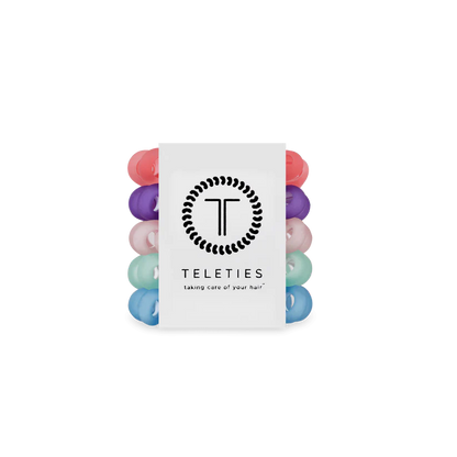 Set of five vibrant TELETIES Hair Ties, available in small, medium, and large sizes, with logo and slogan on white card.